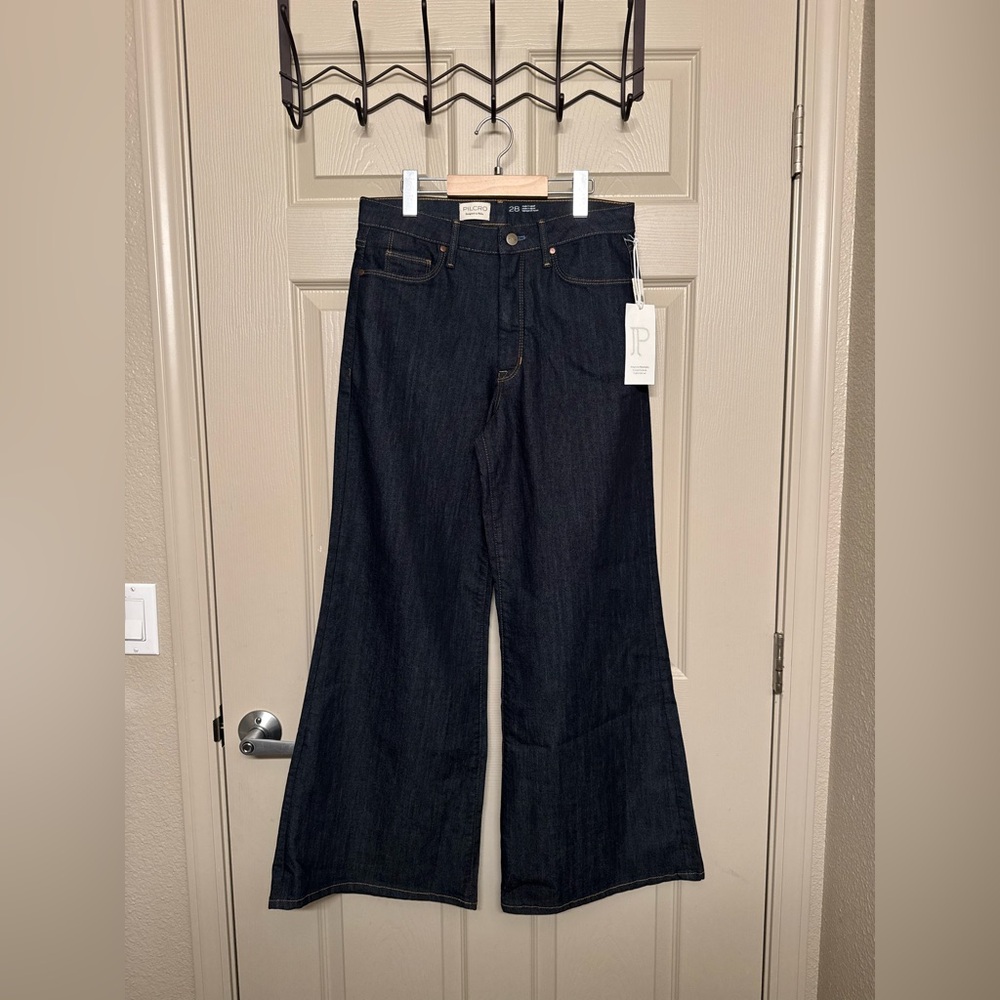 Anthropologie | The Robbie High Rise Flared Fray Jeans by Pilcro in Size 28